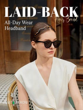 EVITA PERONI headband worn with glasses demonstrating non-slip eyewear compatibility