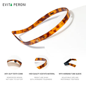 EVITA PERONI headband beside ruler to illustrate compact size and flexible fit