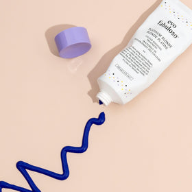EVO on bathroom shelf styled in lifestyle setting for daily use
