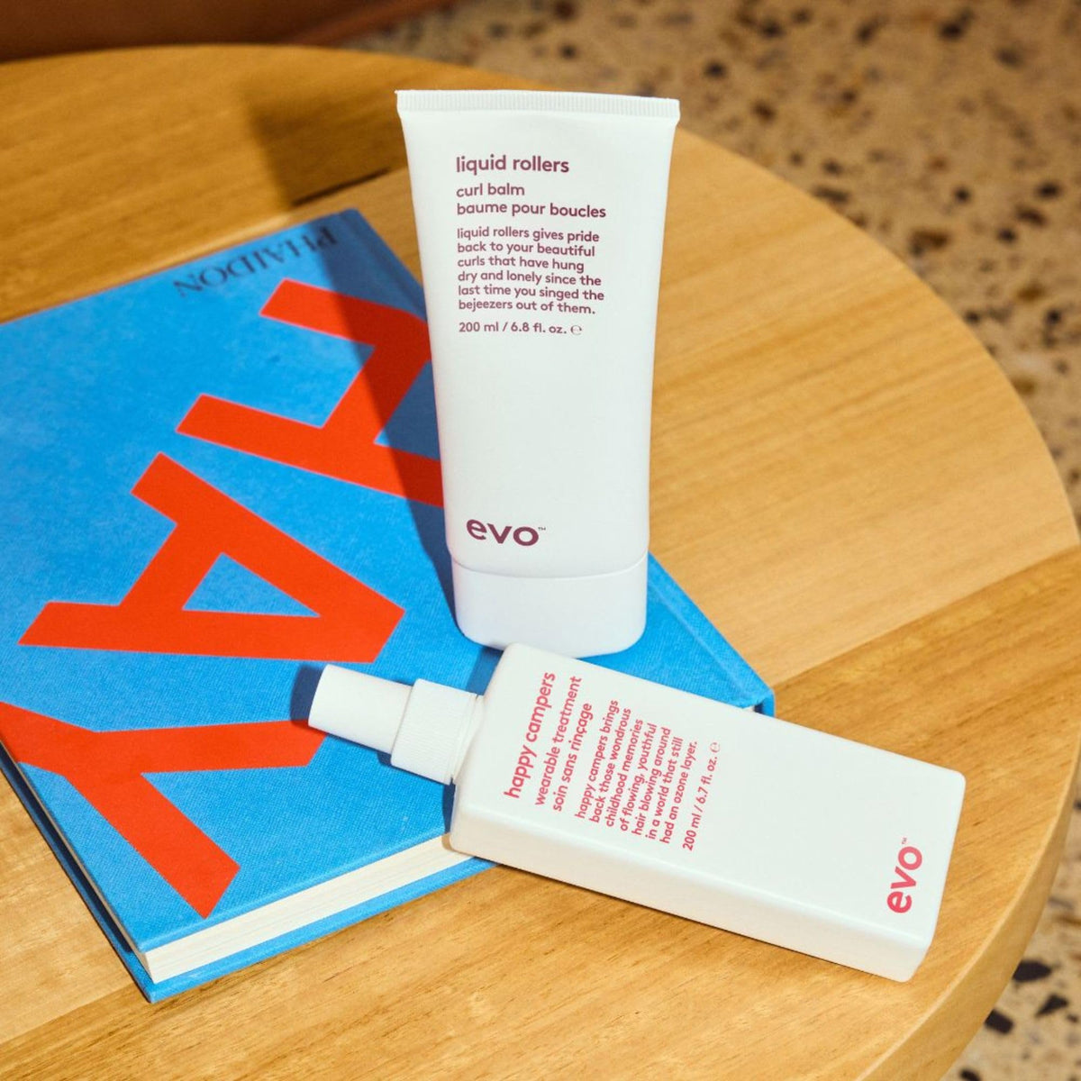 EVO bottle in beach setting emphasizing UV protection benefit