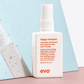 EVO travel pouch with bottle among styling essentials for on-the-go convenience