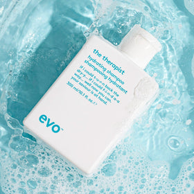 EVO The Therapist in bathroom shelf scene showing styling routine benefit
