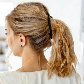 Exacoo half-up style demonstration showing added volume and vintage look benefit