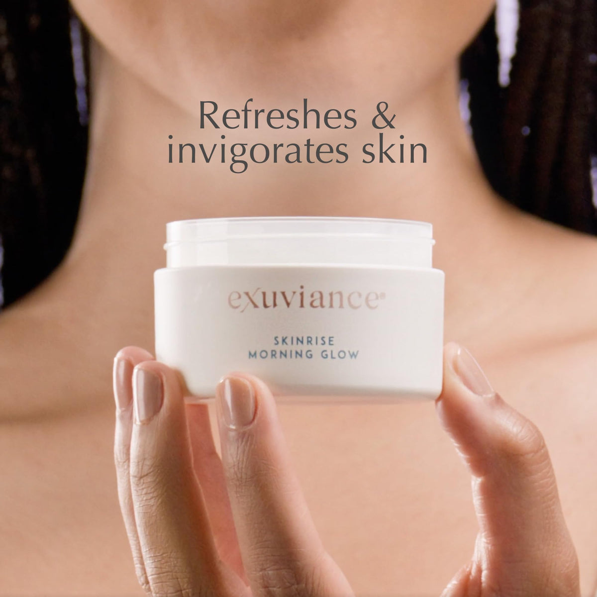 EXUVIANCE pads on bathroom counter suggesting simple skincare routine