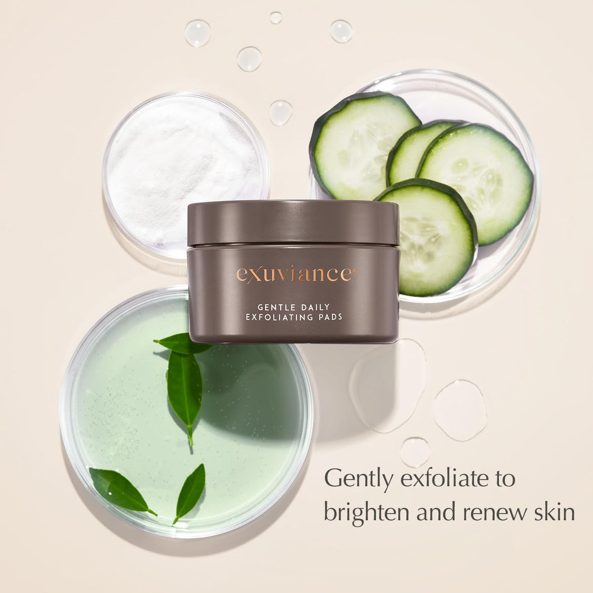 EXUVIANCE pads beside cucumber and green tea showing botanical soothing benefits