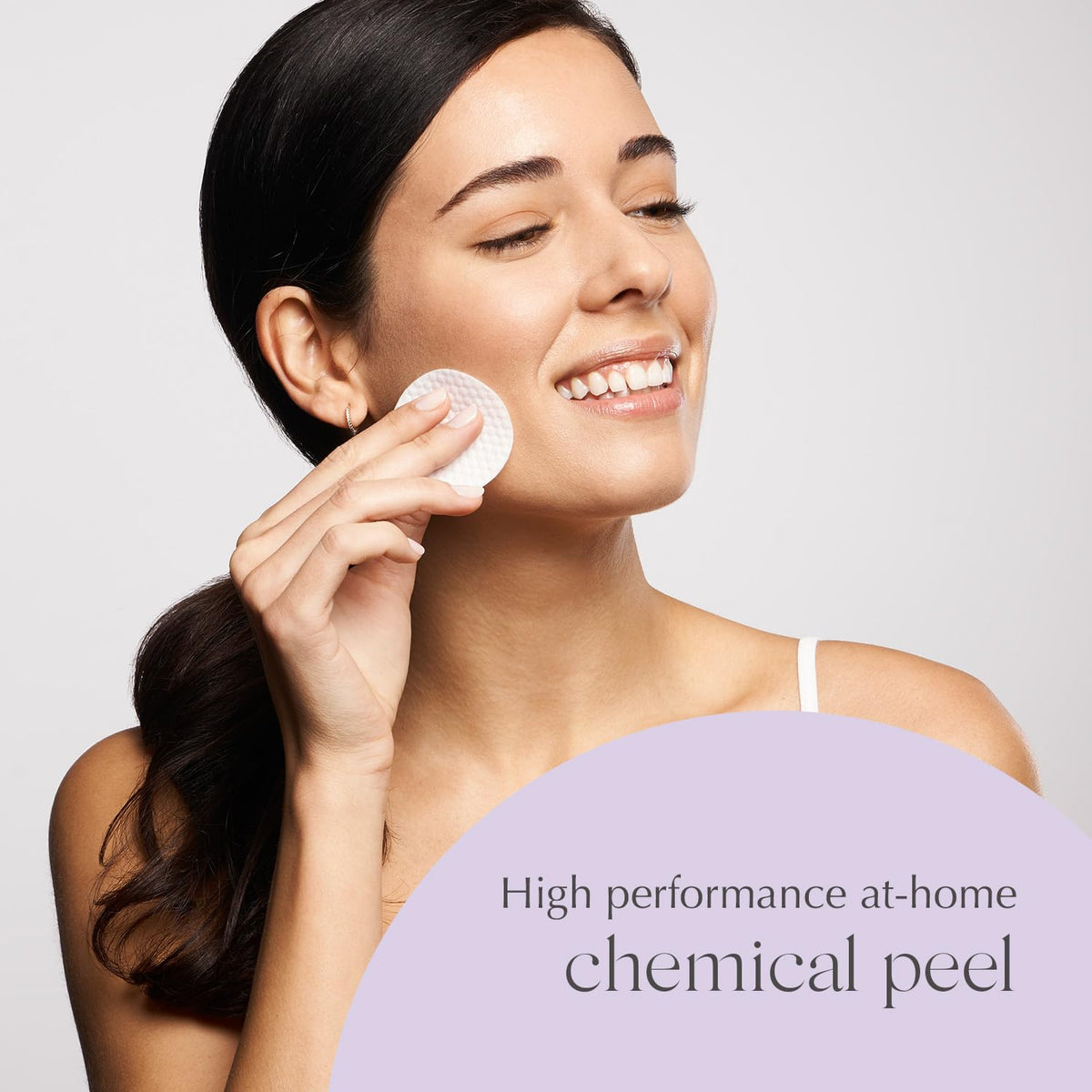 EXUVIANCE label close-up showing active ingredients for targeted exfoliation