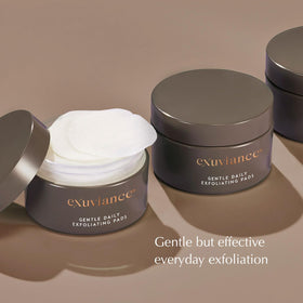 EXUVIANCE pad gliding on skin to show gentle exfoliation and smoother complexion