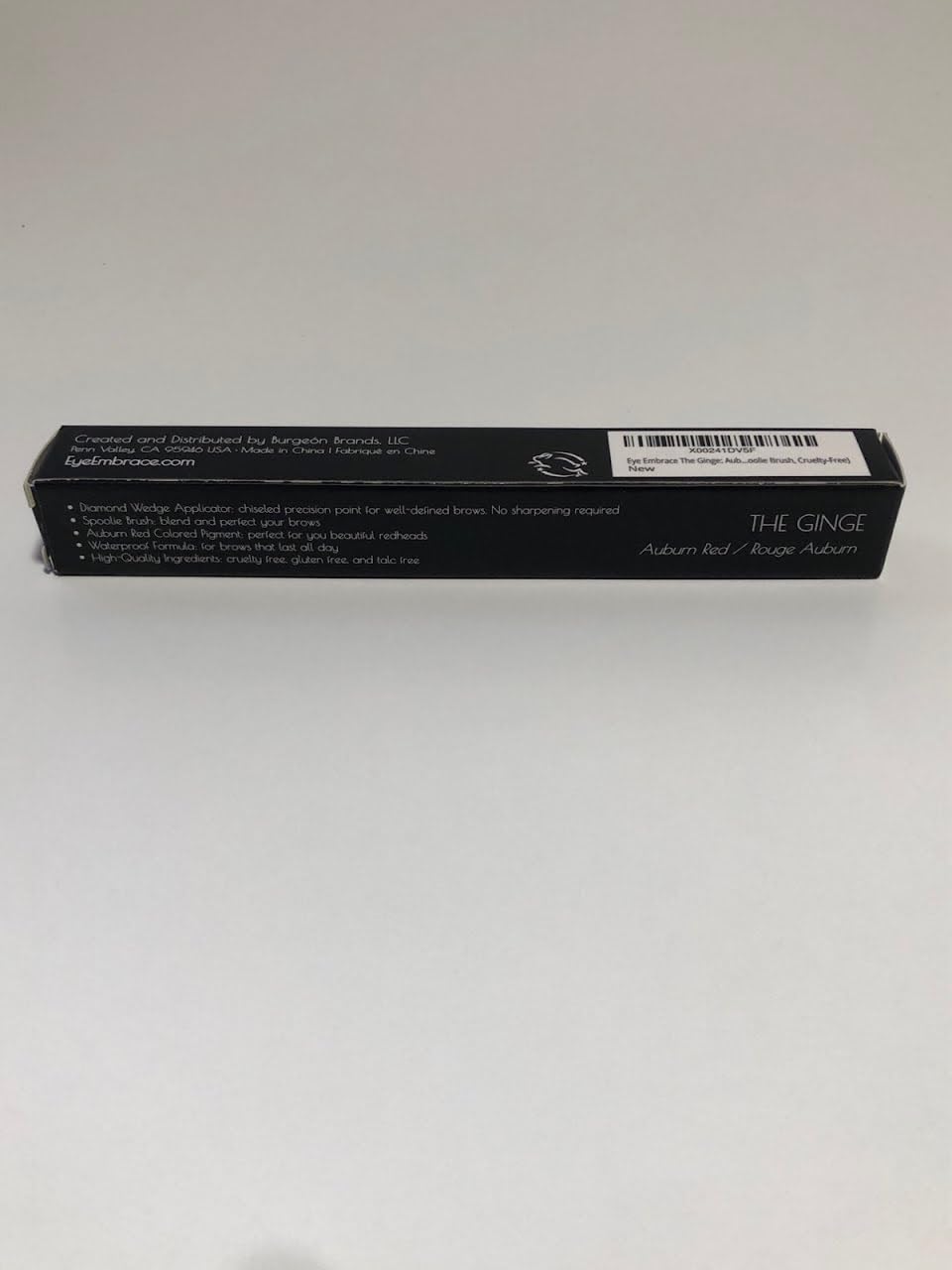 Eye Embrace pencil with water droplets demonstrating waterproof wear