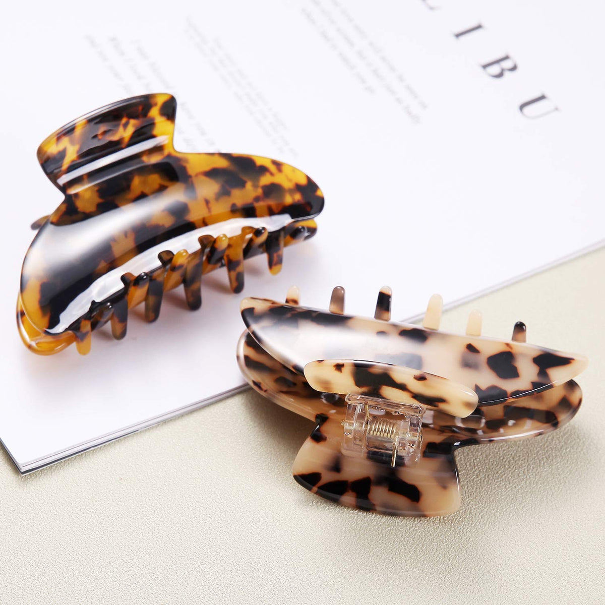 Eyegla close-up of tortoise pattern highlighting polished acetate texture and classic look