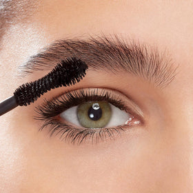 Eyeko applied on lashes close-up for visible curl and length benefits