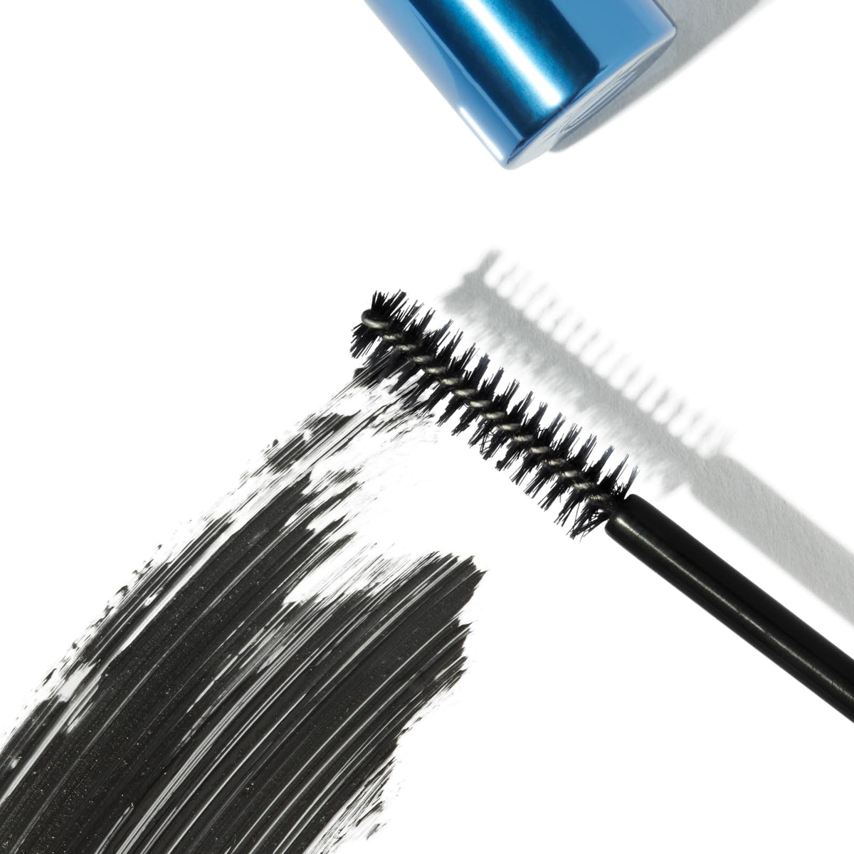 Eyeko Beach Waterproof Mascara displayed next to ruler showing 8ml size for scale