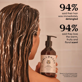 Fable & Mane conditioner in hand showing size and easy application benefit