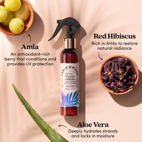 Fable & Mane label close-up showing amla and aloe ingredients