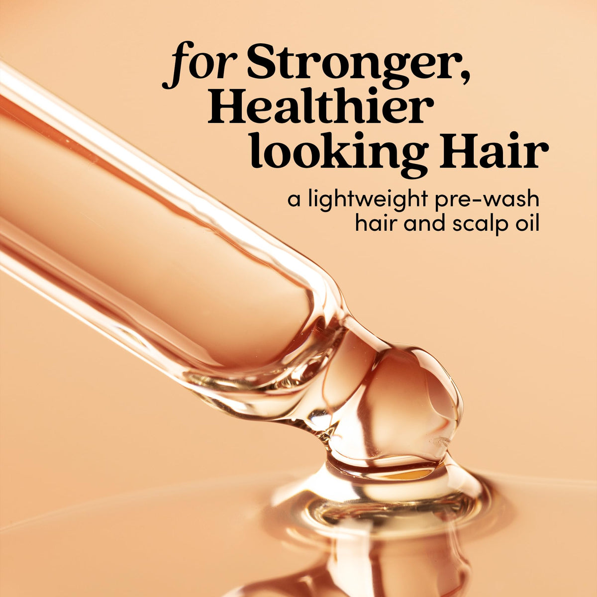 Fable & Mane close-up of oil texture on fingertips, demonstrates lightweight absorption