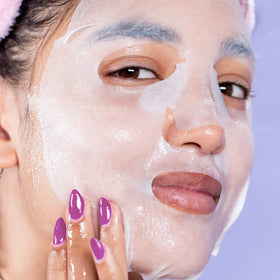 FACETORY mask held in hand showing scale and easy single-use benefit