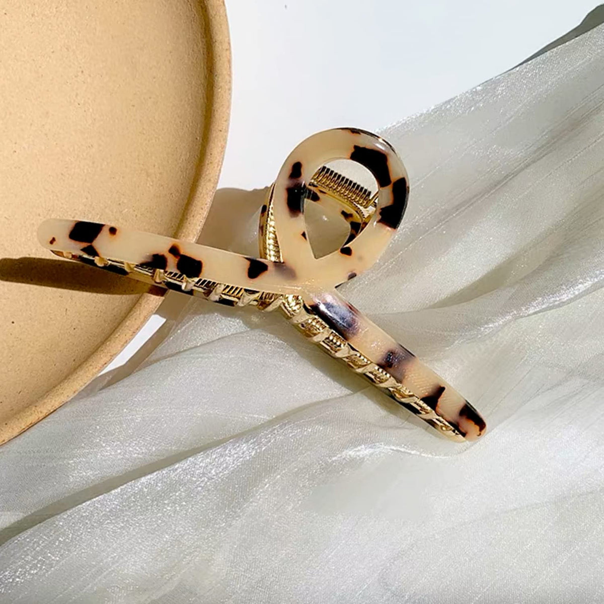 FAELBATY acetate texture close-up highlighting smooth finish