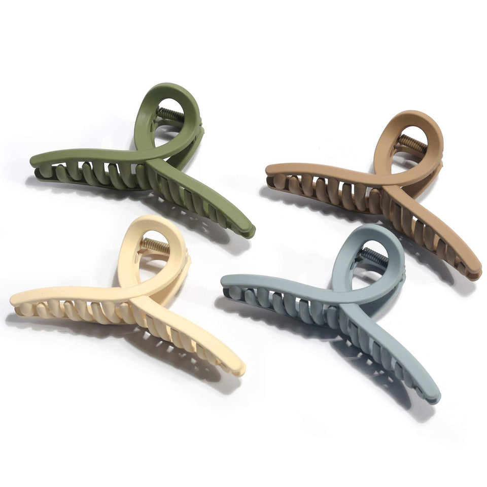FAELBATY front view of four butterfly clips showing colors and gift-ready look
