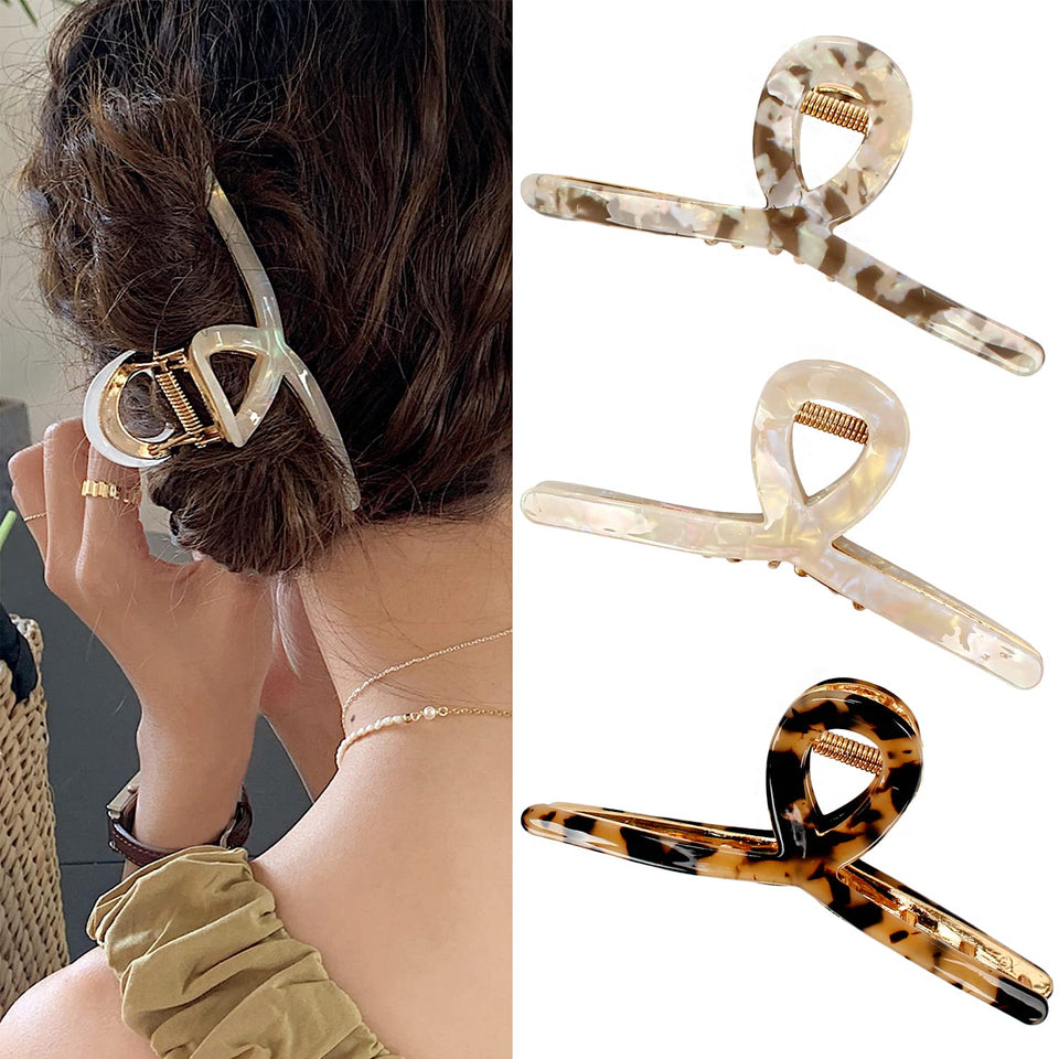 FAELBATY front view of three butterfly clips shows style and variety
