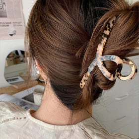 FAELBATY half-up hairstyle showing elegant lift and style