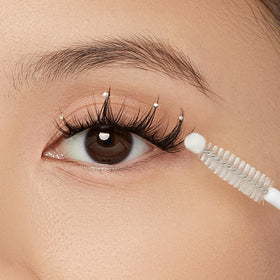 FALSCARA brush applicator close-up enabling precise lashline application and control