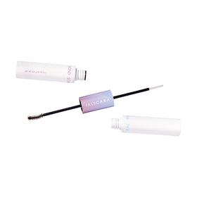 FALSCARA KISS applying a wisp with applicator demonstrating precise placement benefit