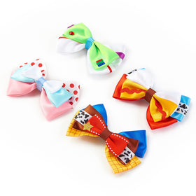 Four Fancheer bows laid flat displaying variety of cartoon-inspired designs