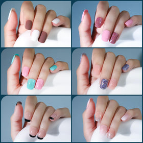 Fandamei nails on hand for size comparison showing short length comfort and everyday wear