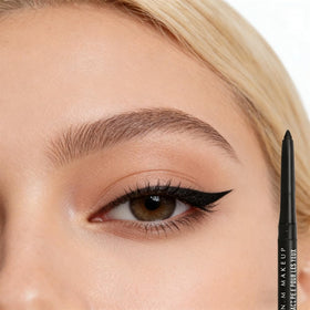 FangTangDI pencil in use applying precise eyeliner for clean definition and blendability