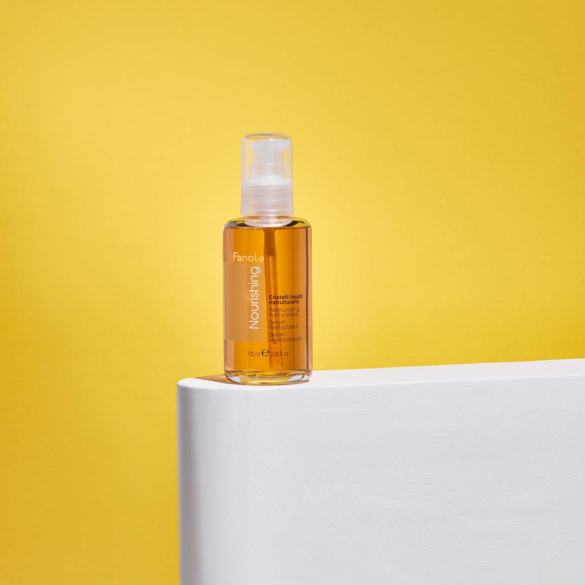 Fanola application on wet hair demonstrating detangling and frizz reduction benefit