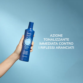 Fanola shampoo applied to hair during toning for neutralizing warmth