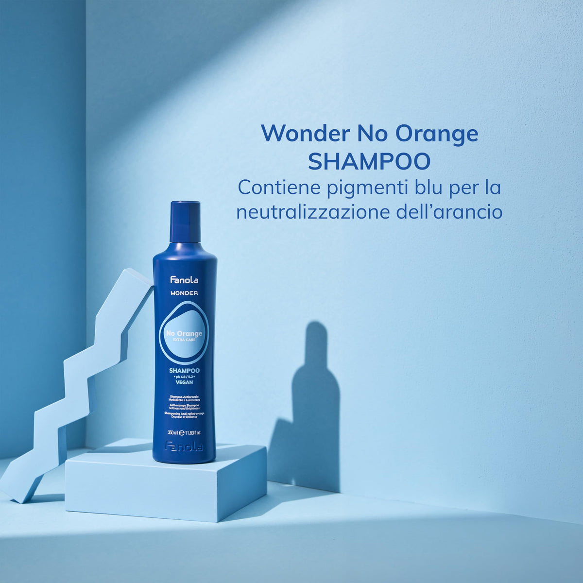 Fanola blue shampoo texture pouring to illustrate pigment and consistency