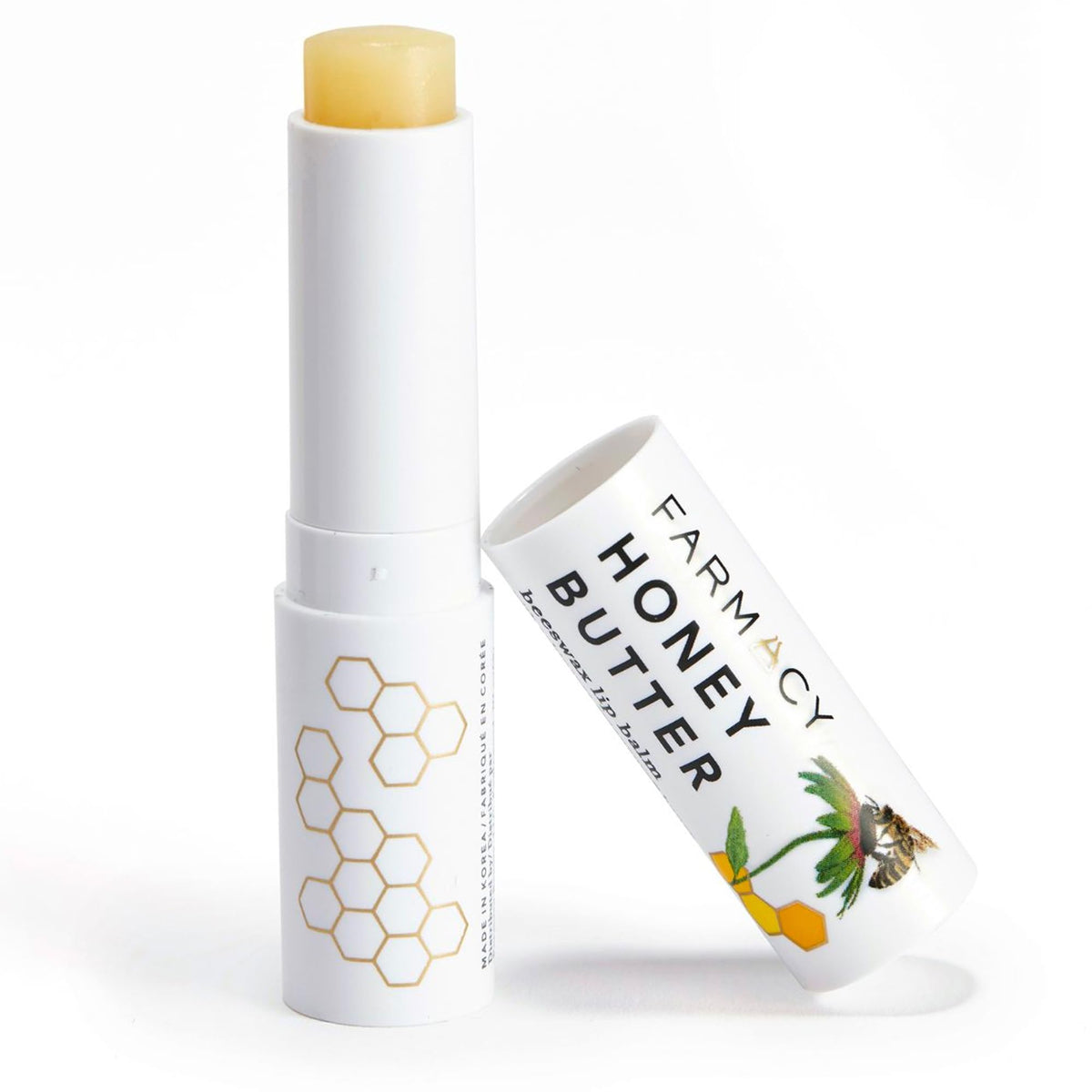 Farmacy beeswax lip balm front packaging shows product and benefits