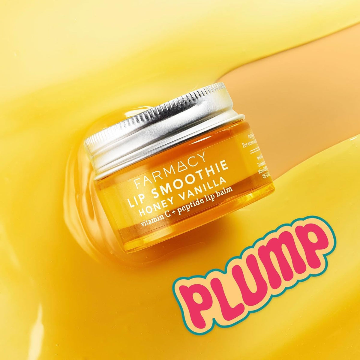 Farmacy high-gloss shine on lips demonstrating plumping and luminous benefit