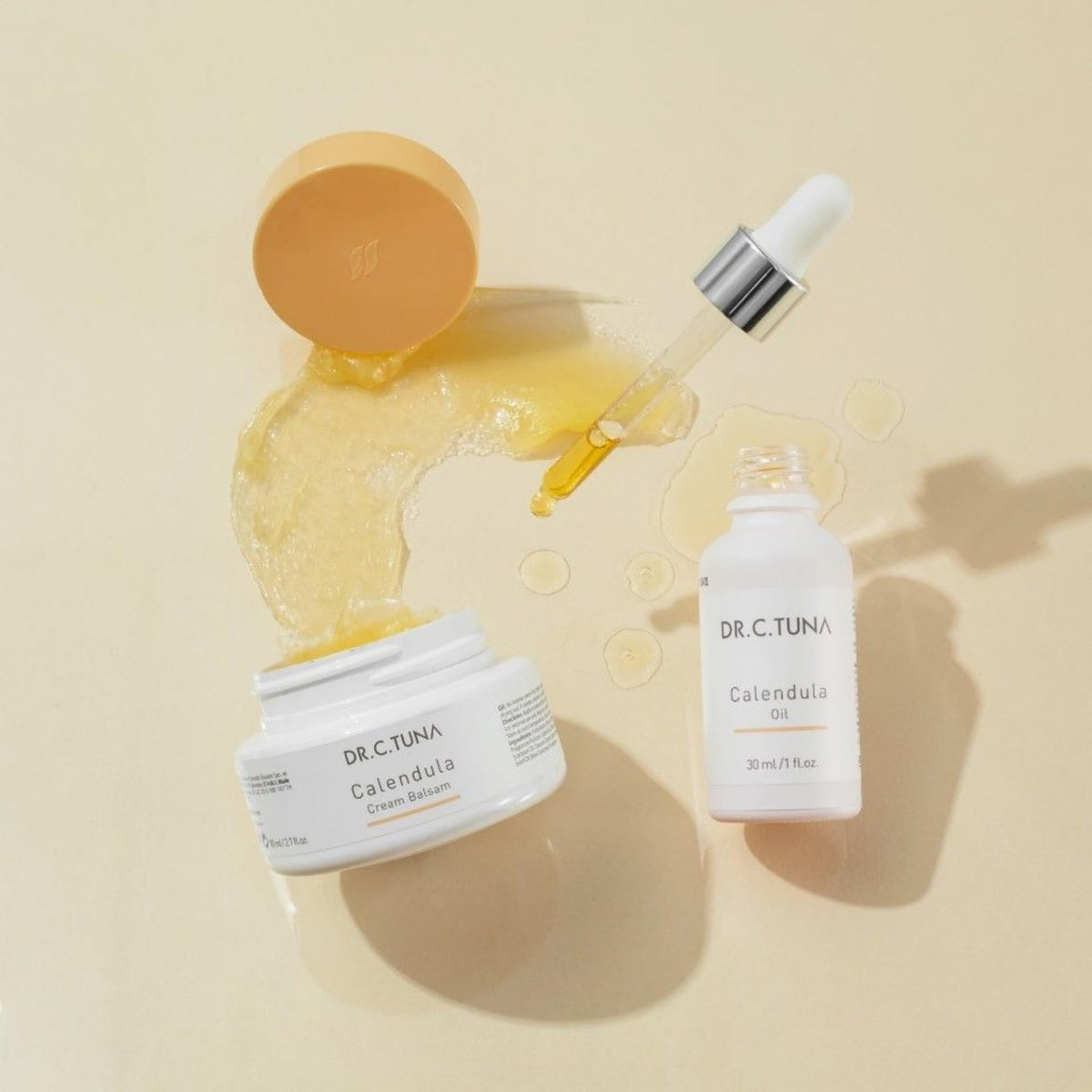 FARMASi botanical oils and calendula extract bottles grouped, emphasizes natural ingredients