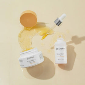 FARMASi botanical oils and calendula extract bottles grouped, emphasizes natural ingredients