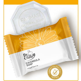 FARMASi calendula soap next to ruler showing the 4.41 oz size
