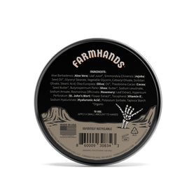 Farmhands open tin showing smooth cream texture for quick absorption