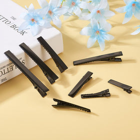 FASHEWELRY clips scattered in salon setting illustrating professional use