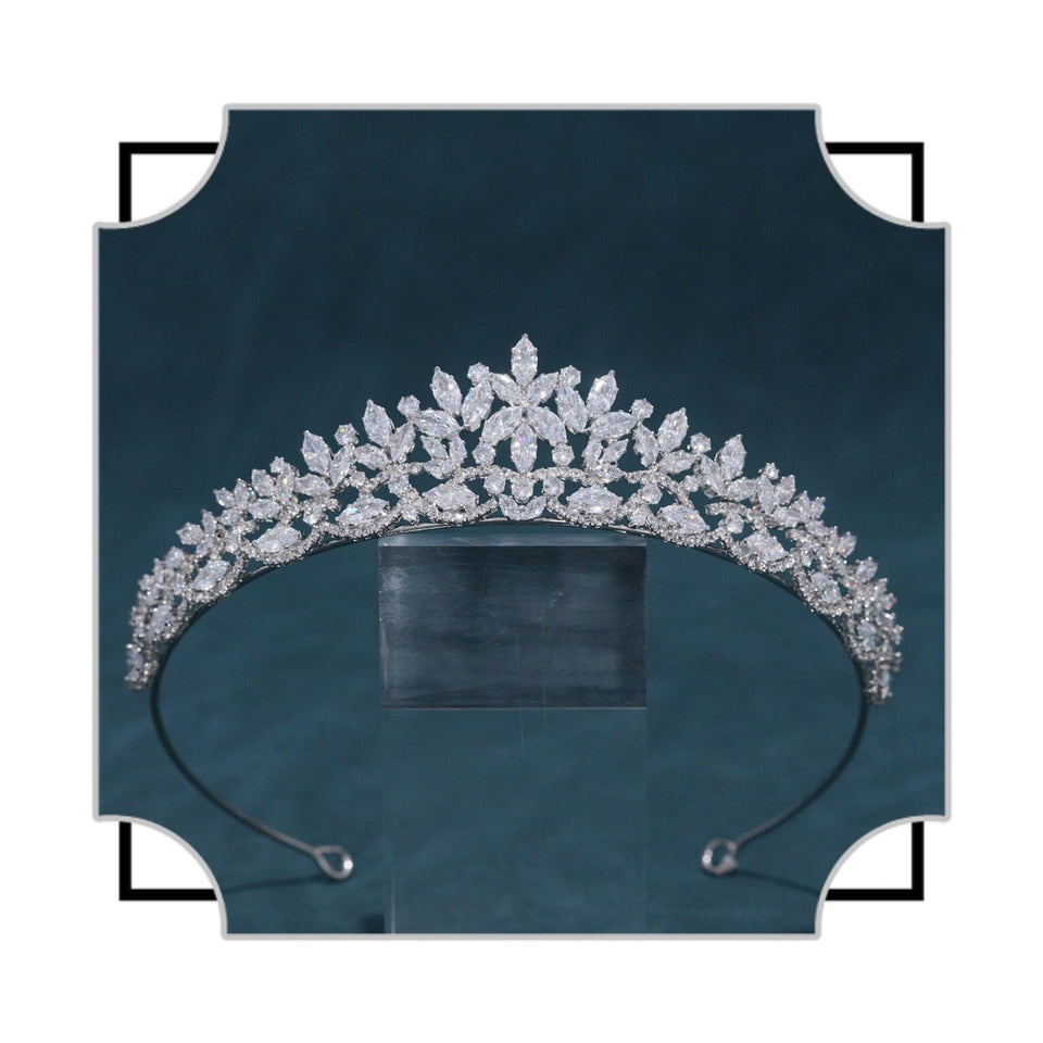 FASNAHOK front view of silver CZ tiara showing balanced floral silhouette and sparkle