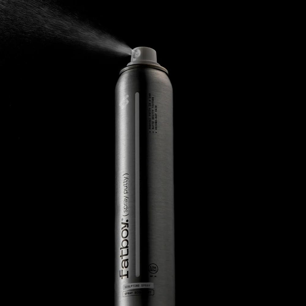 Fatboy Hair spraying at roots to show instant lift and fullness benefit