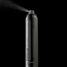 Fatboy Hair spraying at roots to show instant lift and fullness benefit