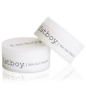 Fatboy Sea Salt Pomade next to a 2.6 oz ruler for scale and portable convenience