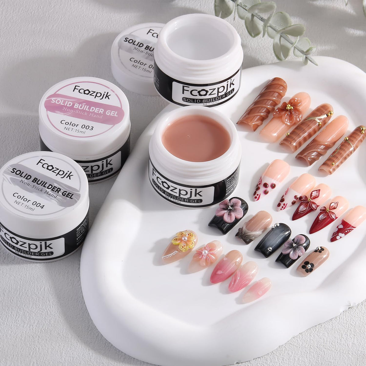 Fcozpjk 3D flower sculpted nail showing raised detail and long-lasting hold