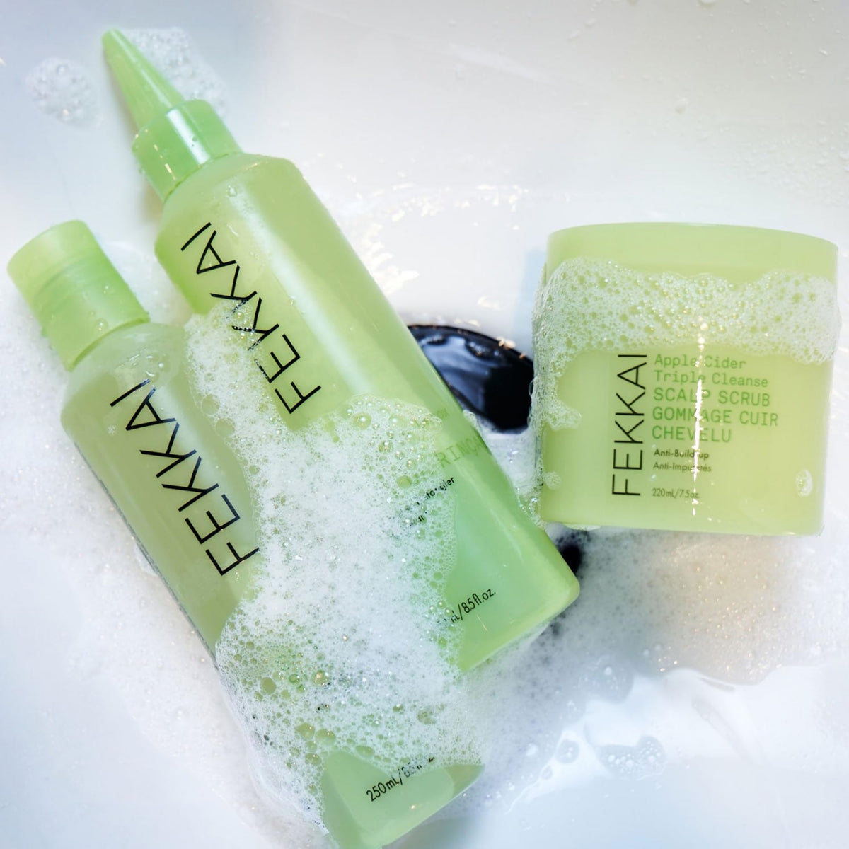 Fekkai scoop of scrub on hand demonstrating usable amount and smooth application