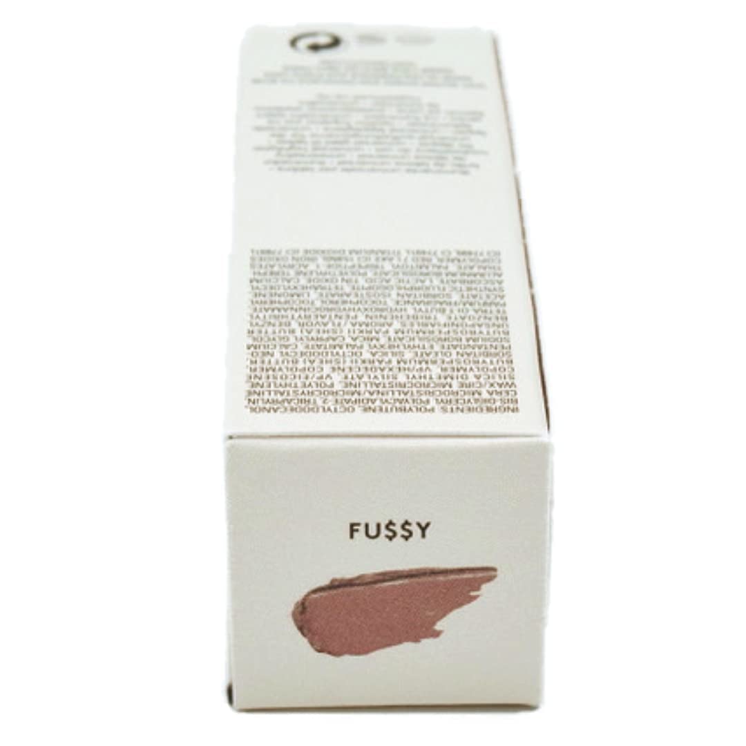 FENTY BEAUTY gloss in handbag lifestyle shot demonstrating easy portability and quick touch-ups