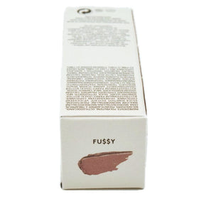 FENTY BEAUTY gloss in handbag lifestyle shot demonstrating easy portability and quick touch-ups