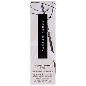 FENTY BEAUTY gloss stick held in hand to show portability and ease