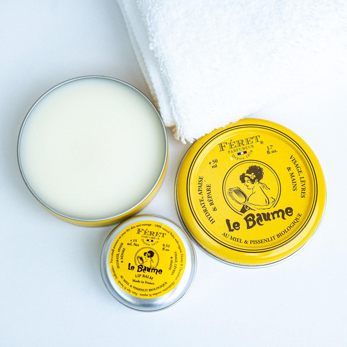 Feret Parfumeur balm styled with roses illustrating the powdery rose scent