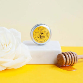 Feret Parfumeur open tin topview revealing creamy balm and easy access benefit