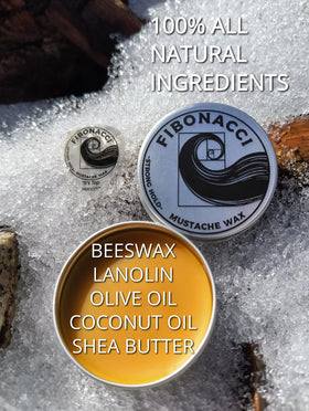 Flat lay of Fibonacci Mustache Wax ingredients showing natural components and purity